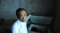 Tian Xueming, Ayah asal Tiongkok simpan jenazah sang anak di dalam lemari pendingin selama bertahun-tahun. Source: Chinasmack.com