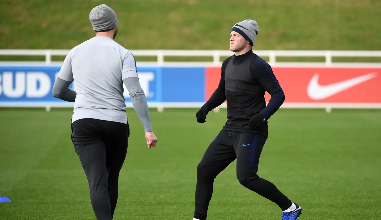 Wayne Rooney akan melakoni laga perpisahan pada laga kontra Amerika Serikat di stadion Wembley, kamis (15/11). (AFP/Paul Ellis)