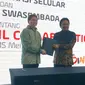 Penandatanganan MoU kerja sama paket bundling Telkomsel dan Erajaya Group oleh Direktur Sales Telkomsel Sukardi Silalahi (kanan) dan CEO Erajaya Group Hasan Aula, Selasa (15/5/2018). Liputan6.com/ Agustin Setyo Wardani