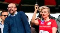 Reaksi Perdana Menteri Belgia Charles Michel saat Putri Astrid menembakan peluru tanda dimulainya lomba maraton (AFP)