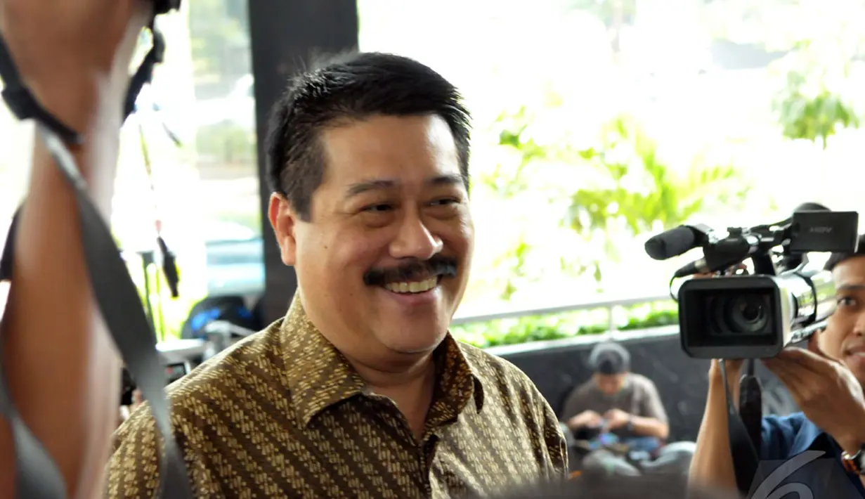 Wakil Ketua PPATK, Agus Santoso mendatangi kantor KPK, Jakarta, Selasa (9/9/2014) (Liputan6.com/Panji Diksana)