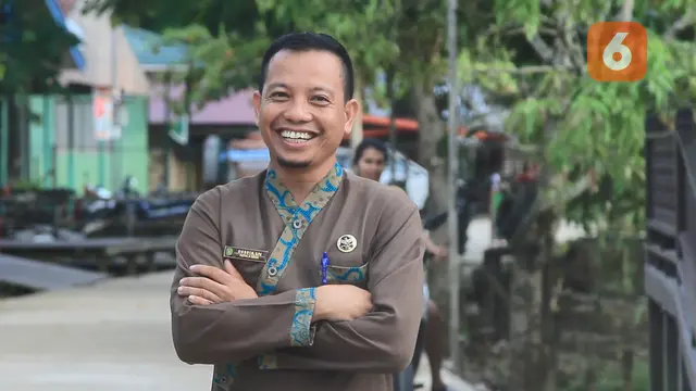 Kepala Desa Sungai Payang, Rusdin.