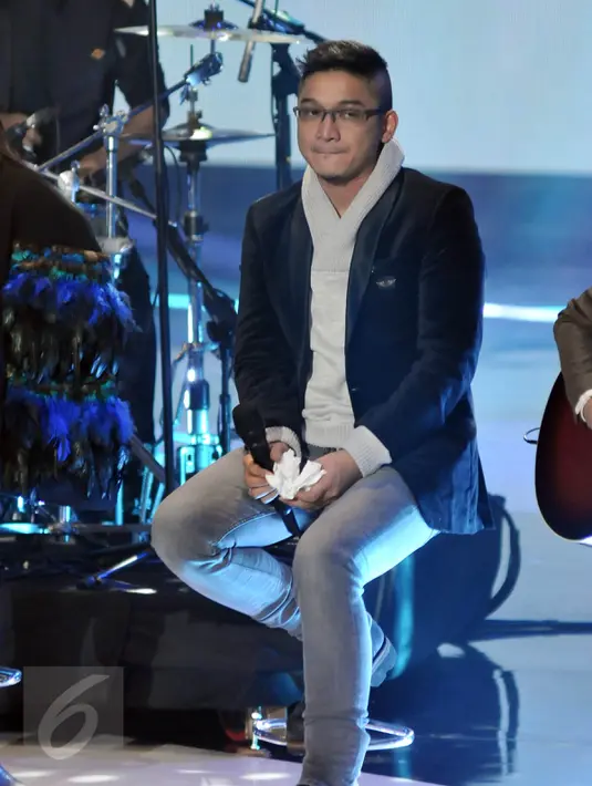 Wakil Walikota Palu, Sigit Purnomo alias Pasha memberi kejutan secara tiba-tiba hadir di acara SCTV Music Awards 2016 di Jakarta, Kamis (28/4). Dalam kesempatan itu, Pasha menegaskan dirinya tetap menjadi vokalis band Ungu  (Liputan6.com/Johan Tallo)
