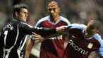 Newcastle's Joey Barton grapples with Aston Villa's Gabriel Agbonlahor during Premiership game between Newcastle United and Aston Villa, on November 3, 2008, in Newcastle. AFP PHOTO/CRAIG BROUGH