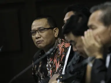 Terdakwa korupsi pengadaan dan pelaksanaan pembangunan kampus IPDN Sumbar di Kab Agam TA 2011, Dudy Jocom menjalani sidang lanjutan di Pengadilan Tipikor Jakarta, Rabu (12/9). Sidang mendengar keterangan saksi dari JPU. (Liputan6.com/Helmi Fithriansyah)