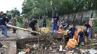 Untuk mencegah titik banjir meluas, Dinas Pekerjaan Umum dan Penataan Ruang (PUPR) Kota Tangerang melakukan sejumlah langkah antisipasi.(Liputan6.com/Pramita Tristiawati)