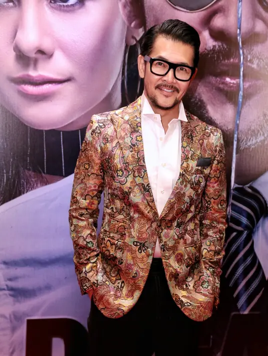 "Film yang cukup banyak hal-hal yang bagus saya inget. Disini saya jadi umur 35 dan 60 tahun, jadi dari intonasi suara harus berbeda,”  kata Ferry Salim di XXI Plaza Senayan, Jakarta Pusat, Selasa (21/3/2017). (Adrian Putra/Bintang.com)