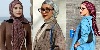 Padu padan knitted dress dan hijab segi empat bermotif sempurna untuk liburan di pantai. [@emyaghnia]