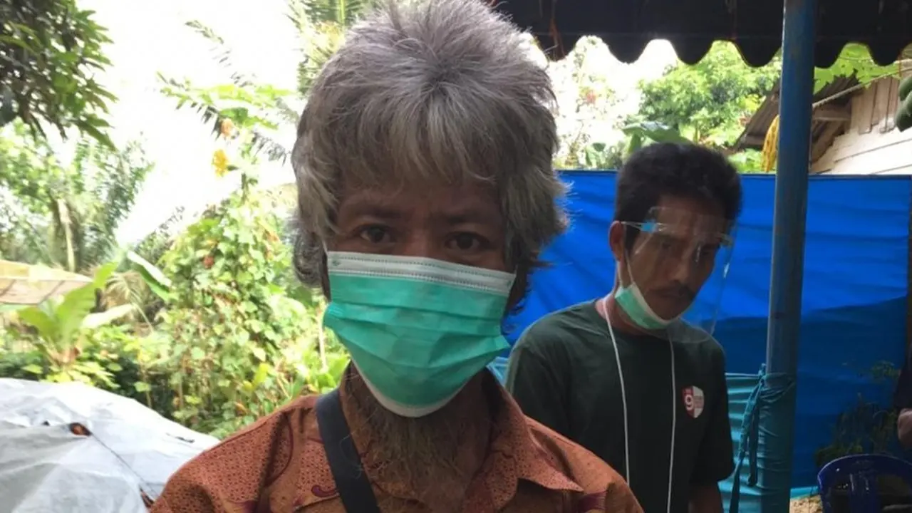 Tungganai Baseman usai menyalurkan hak pilihnya di TPS 06 RT 3 Desa Bukit Suban, Kecamatan Air Hitam, Kabupaten Sarolangun, Jambi.(Liputan6.com/dok KKI Warsi)