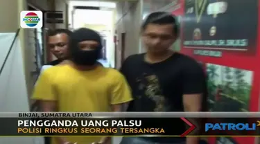 Polisi berhasil membongkar upaya penggandaan uang palsu di Binjai Sumatra Utara. 