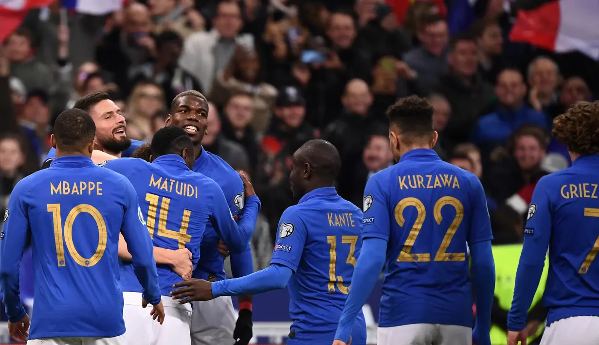 Perayaan gol Antoine Griezmann pada laga kedua Kualifikasi Piala Eropa 2020 Grup H yang berlangsung di Stadion Stade de France, Paris, Selasa (26/3). Perancis menang 4-0 atas Islandia. (AFP/Franck Fife)