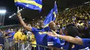 Hasil imbang tersebut mengukuhkan performa konsisten Curacao di Grup B Kualifikasi Piala Dunia 2026 zona CONCACAF yang sebelumnya mencatat tiga kemenangan dan tiga hasil imbang tanpa kekalahan. Tampak dalam foto, suporter Timnas Curacao merayakan hasil imbang melawan Jamaika pada Grup B Kualifikasi Piala Dunia 2026 zona CONCACAF di Independence Park Stadium, Jamaika pada 18 November 2025. (Ricardo MAKYN/AFP)