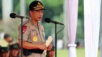 Kapolri Jenderal Tito Karnavian memberi sambutan saat memimpin Apel Kesiapan Natal, Tahun Baru dan Pemilu 2019, Jakarta, Jumat (30/11). Apel diikuti 50.000 personel dari AD, AL, AU, dan Polri. (Liputan6.com/Johan Tallo)