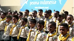 Puluhan peserta Jambore asal Papua tiba di Pelabuhan Tanjung Priok, Jakarta, Kamis (30/6). Mereka akan mengikuti jambore se-asia pasifik pada tanggal 12-16 Juli diikuti 14 Negara asia pasifik yang diselenggarakan di Bandung. (Liputan6.com/Faizal Fanani)