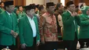 Menko Polhukam Mahfud Md didampingi Plt Ketua Umum PPP Suharso Monoarfa menghadiri Musyawarah Kerja Nasional (Mukernas) ke V PPP di Jakarta, Sabtu (14/12/2019). Salah satu agenda yang akan dibahas dalam acara ini adalah pelaksanaan Muktamar PPP. (Liputan6.com/Angga Yuniar)