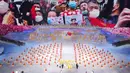 Para pemain ambil bagian dalam pertunjukan gala menjelang peringatan 100 tahun berdirinya Partai Komunis China di Beijing, China, 28 Juni 2021. Partai Komunis China akan merayakan HUT ke-100 pada 1 Juli 2021. (AP Photo/Ng Han Guan)