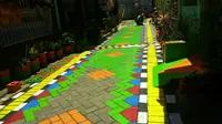 Program arisan lorong garden warga sebenarnya merupakan strategi untuk menanggulangi masalah anggaran pembinaan. (Liputan6.com/Eka Hakim)