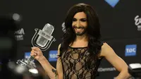 Conchita Wurst yang terkenal sebagai waria, akhirnya berhasil menjadi juara pertama dari Austria di ajang Eurovision 2014.