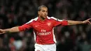 Aksi selebrasi winger Arsenal Theo Walcott seusia mencetak gol ke gawang Barcelona pada leg pertama babak perempat final Liga Champions di Emirates Stadium, London, 31 Maret 2010. AFP PHOTO/ADRIAN DENNIS