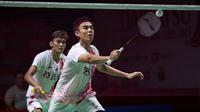 Pebulutangkis ganda putra Indonesia, Muhammad Sohibul Fikri/Bagas Maulana bertanding melawan pebulutangkis ganda putra Jepang Takuro Hoki/Yugo Kobayashi Jonatan pada laga perempat final Indonesia Masters 2023 di Istora Senayan, Jakarta, Jumat (27/01/2023). Bagas/Fikri kalah dengan skor 11-21, 13-21. (Bola.com/Bagaskara Lazuardi)