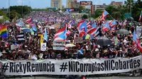 Demonstrasi Puerto Rico Juli 2019, disebut sebagai salah satu yang terbesar dalam sejarah teritori Amerika Serikat itu. Massa mendesak Gubernur Ricardo Rossello untuk mundur. (Carlos Giusti / AP PHOTO)