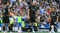 Pemain Manchester City tertunduk lesu saat kalah dari Brighton di Liga Inggris (AFP)