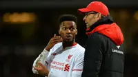 Daniel Sturridge (kiri) bersama manajer Liverpool Jurgen Klopp (kanan). (AFP/Glyn Kirk)