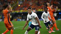 Ekspresi striker Inggris, Ollie Watkins usai menjebol gawang Belanda di semifinal Euro 2024,  Kamis (11/7/2024) dini hari WIB. (OZAN KOSE / AFP)