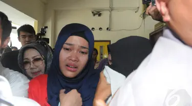 Pelaku pembunuhan Ade Sara, Assyifa Ramadhani divonis 20 tahun penjara oleh Pengadilan Negeri Jakarta Pusat, Selasa (9/12/2014). (Liputan6.com/Herman Zakharia)