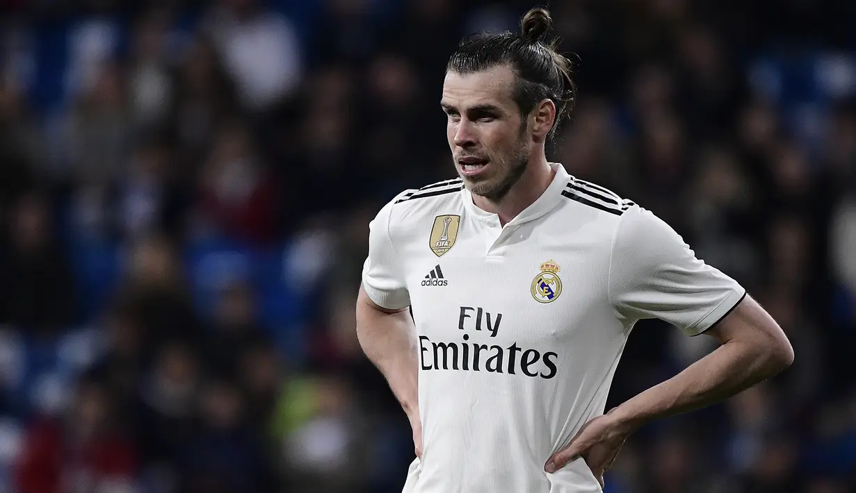 1. Gareth Bale - Dirinya bukan sosok pemain yang dicintai suporter Real Madrid, menjualnya menjadi pilihan tepat karena gelandang asal Wales ini masih memiliki harga jual yang tinggi dan banyak peminatnya. (AFP/Javier Soriano)