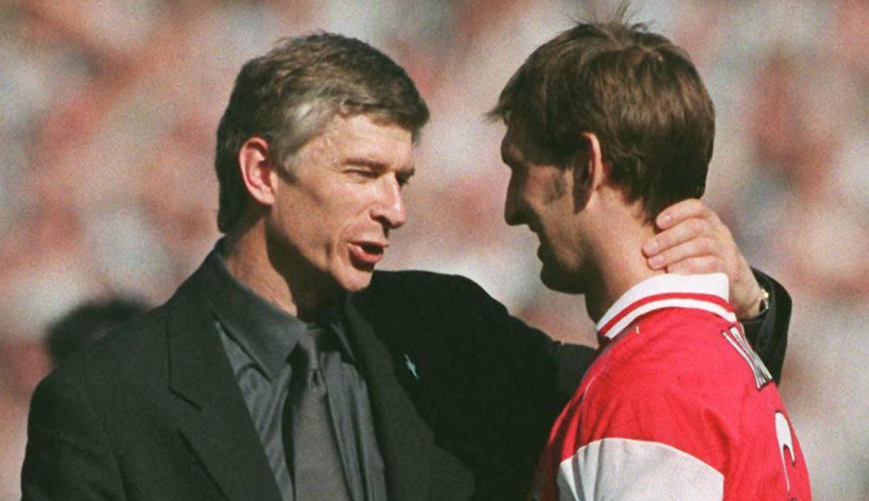 Selama membela Arsenal, ia sukses mempersembahkan 4 gelar juara Liga Inggris, 3 Piala FA, 2 Piala Liga, dan 2 Community Shield. Adams menjadi salah satu pemain paling sukses dalam sejarah Arsenal. (Foto: AFP/Paul Vicente)