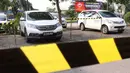 Sejumlah mobil terparkir berjarak di Rest Area KM 13,5 Palm Square Tol Jakarta-Tangerang, Jumat (29/5/2020). Penerepan parkir berjarak dan pengecekan suhu tubuh di area tersebut diberlakukan untuk menekan penyebaran Covid-19. (Liputan6.com/Angga Yuniar)