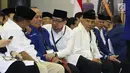 Amien Rais (kanan) jelang mendampingi pasangan Prabowo/Sandi Uno mendaftar bakal Capres/Cawapres Pemilu 2019 di Gedung KPU, Jakarta, Jumat (10/8). (Liputan6.com/Helmi Fithriansyah)