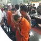 Direktorat Reserse Kriminal Umum Polda Metro Jaya saat merilis kasus penembakan istri yang dilakukan Dokter Helmi. (Liputan6.com/Hanz Jimenez Salim)