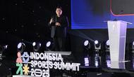 Menteri Pemuda dan Olahraga, Erick Thohir, saat menyampaikan keynote speech pada pembukaan Indonesia Sports Summit 2025 (ISS) di Indonesia Arena, Senayan, Jakarta, Sabtu (6/12/2025). Gelaran Indonesia Sports Summit 2025 (ISS 2025) resmi bergulir. (Bola.com/Abdul Aziz)