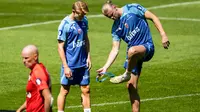 Dua pemain bintang Norwegia: Martin Odegaard dan Erling Haaland. (Fredrik Varfjell / NTB / AFP)