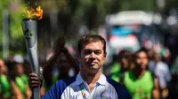 Acara kirab obor di Bali melibatkan dua mantan atlet legendaris Indonesia, Pascal Wimar (Voli) dan Ade Rai (Binaraga) yang bertugas membawa api obor Asian Games 2018.