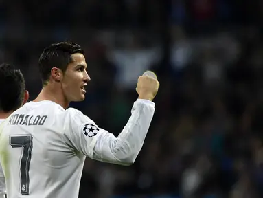 Pemain Real Madrid, Cristiano Ronaldo menjadi top skor sementara liga Champions dengan total 11 gol,  (AFP Photo/Pierre-Philippe Marcou)