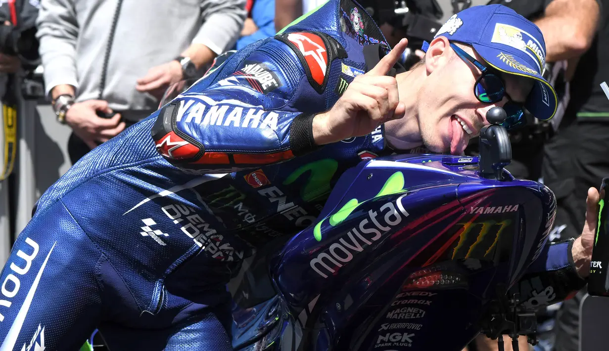 Maverick Vinales berhasil memenangi lomba dengan menorehkan catatan waktu 43 menit 29,793 detik. (AFP/Jean-Francois Monier)