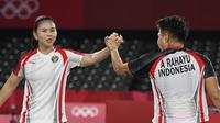 Kemenangan ini membawa Greysia/Apriyani menjadi juara Grup A ganda putri Olimpiade Tokyo. (Foto:AFP/Alexander Nemenov)