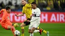 Dortmund tetap perkasa di puncak klasemen grup F dengan mengoleksi 11 poin. (INA FASSBENDER / AFP)