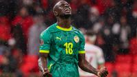 Penyerang Senegal, Sadio Mane, merayakan kemenangan bersama timnya setelah laga final Piala Afrika 2025 antara Senegal dan Maroko di Stadion Prince Moulay Abdellah, Rabat, Senin (25/1/2026) dini hari WIB. (Franck Fife/AFP)