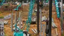 Aktivitas pekerja proyek pembangunan Pasar Senen Blok I dan II di kawasan Pasar Senen, Jakarta Pusat, Rabu (11/3/2020). Proyek pembangunan Pasar Senen Blok I dan II menghabiskan biaya Rp 900 miliar. (Liputan6.com/Faizal Fanani)