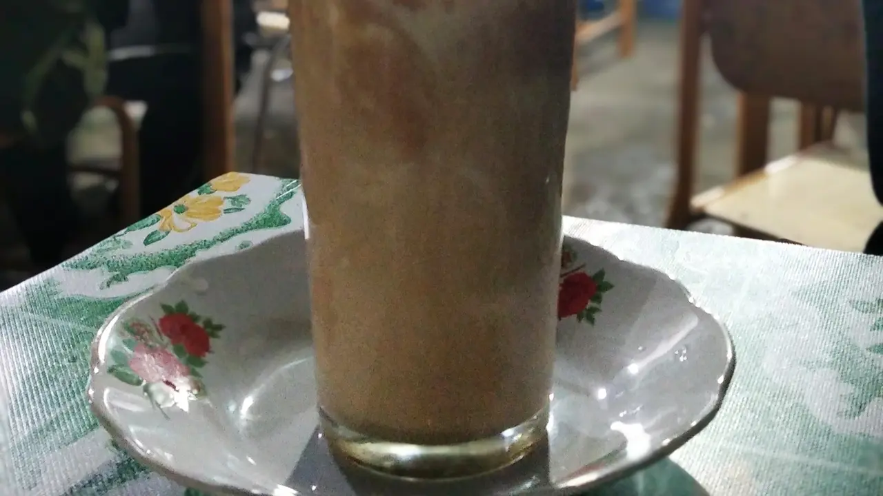 Teh talua tapai. (Liputan6.com/ Novia Harlina)