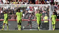 Manchester United babak belur di kandang Brentford pada pekan ke-2 Liga Inggris 2022/2023. MU kalah 0-4 di Gtech Community Sadium, Sabtu (13/8/2022). (AFP/Ian Kington)