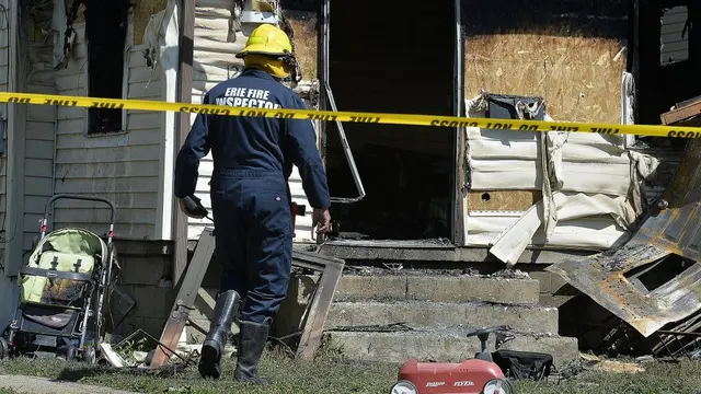 Kebakaran menghanguskan tempat penitipan anak atau daycare di Erie, Pennsylvania. (Greg Wohlford/Erie Times-News via AP)