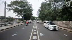 Kendaraan melintas di Jalan Setiabudi Tengah, Jakarta, Minggu (16/6/2019). Rekayasa lalu lintas dari arah Tanah Abang menuju Rasuna Said juga bisa melewati kawasan Landmark-Jalan Sudirman-Jalan Setiabudi Raya-Jalan Setiabudi III. (merdeka.com/Iqbal S. Nugroho)