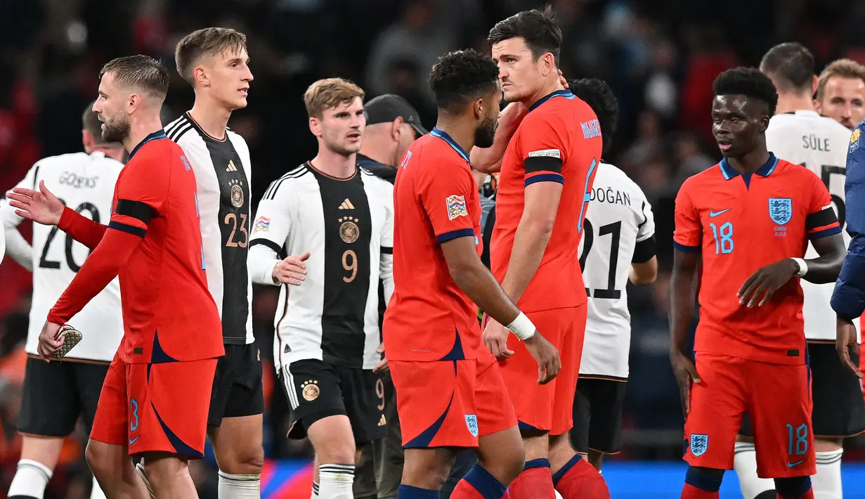 <p>Hingga wasit meniup peluit panjang tanda akhir pertandingan, tidak ada lagi gol yang tercipta. Hasil ini membuat Inggris tetap terdampar di dasar kelasemen sementara Jerman di atasnya dengan selisih empat poin. (AFP/Glyn Kirk)</p>