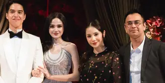 Nagita Slavina tampil mengenakan long dress hitam dengan bordiran bunga, didampingi suaminya Raffi Ahmad yang mengenakan setelan jas hitam. [@raffinagita1717]