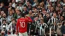 Selebrasi striker Manchester United, Marcus Rashford setelah mencetak gol ke gawang Newcastle United pada laga final Carabao Cup 2022/2023 di Wembley Stadium, London (26/2/2023). Marcus Rashford total mencetak 6 gol dan selalu bermain dalam 6 laga Manchester United sejak putaran ketiga hingga laga final menghadapi Newcastle United. Satu gol disumbangkannya ke jala Newcastle United dalam kemenangan 2-0. (AFP/Adrian Dennis)